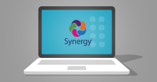 Laptop showing Synergy logo